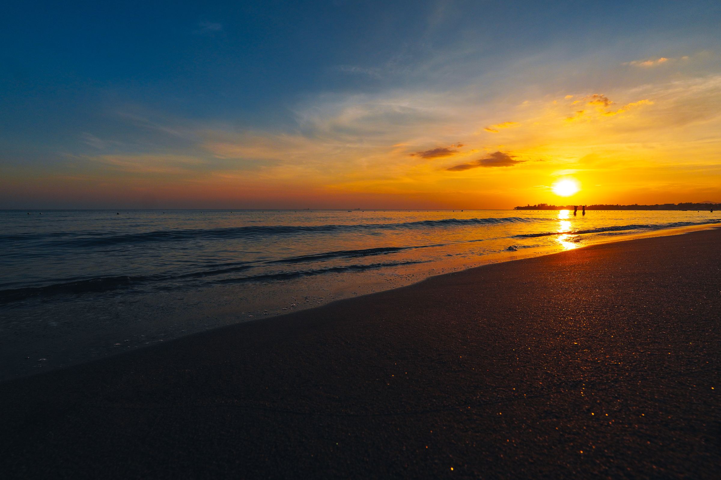 Sunset over the West Philippine Sea from the resort shoreline